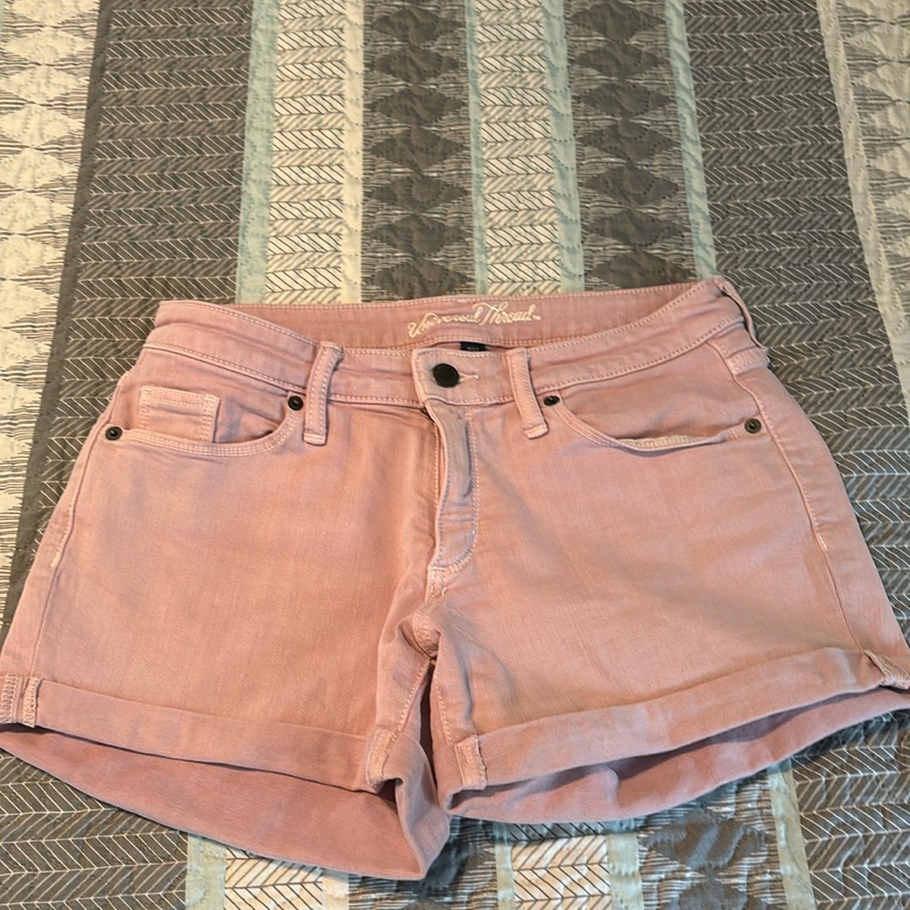 Lilac colored mid rise jean shorts